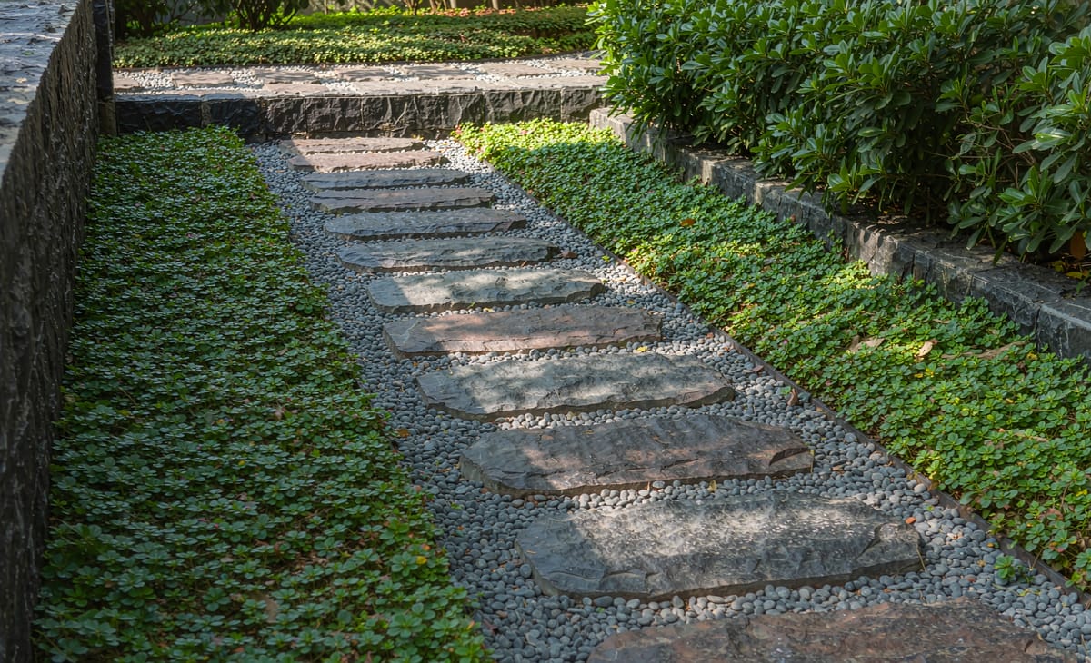 Stepping stones with pebble joints in a garden path