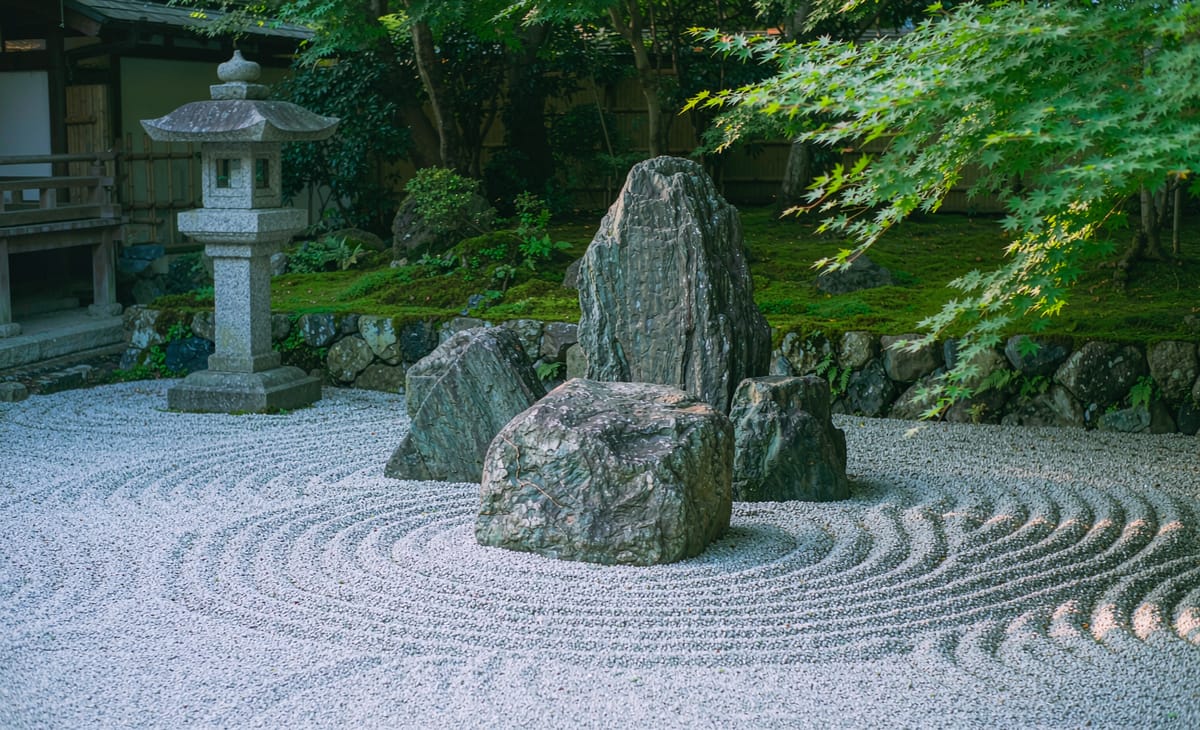 Japanese garden with raked gravel and stone arrangement