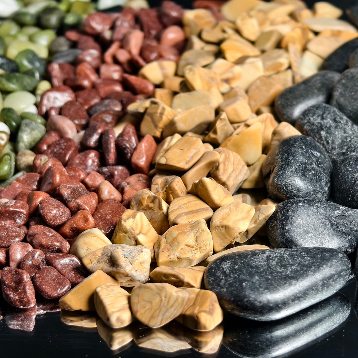 Mixed color pebble stockpile showing the full color range