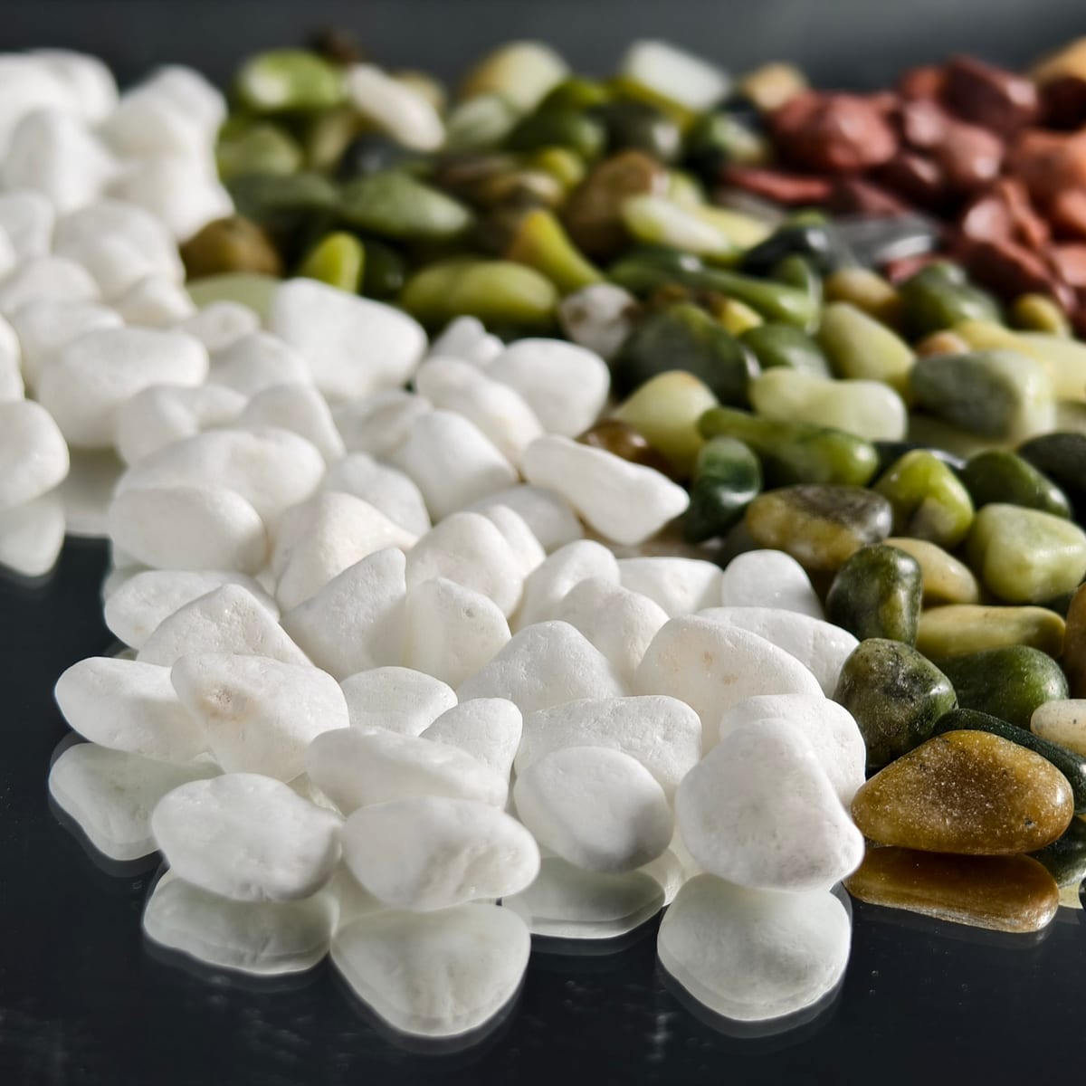 Close-up of polished white pebbles showing smooth finish