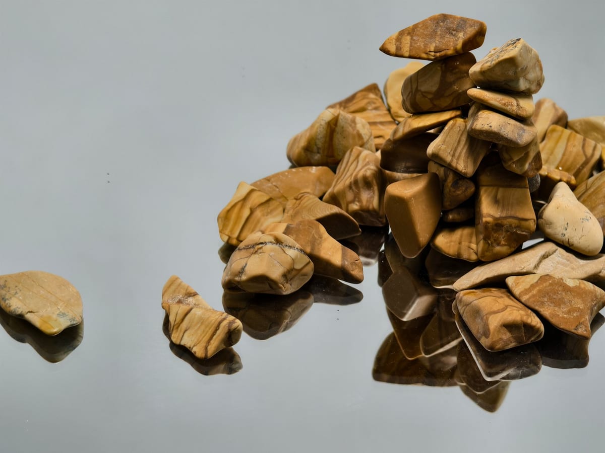 Natural wood grain stone (landscape jasper) in warm tan tones